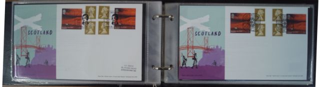 Twelve albums containing definitive regional and booklet First Day Covers