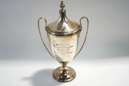 A silver two handled trophy cup and cover, Birmingham 1929, for the Mendip Hunt Point to Point 1932,