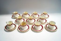 A Royal Crown Derby Mercers Company coffee service, comprising eleven cups and twelve saucers,