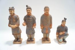 Four Chinese terracotta replica figures of the Terracotta Army,