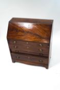 A 19th century mahogany bureau,