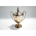 A silver two handled trophy cup and cover, Sheffield 1933,