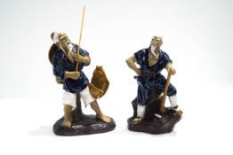 Two Chinese Mudman pottery figures,