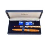 A Burberrys fountain pen, with 14K, 585 Medium nib, boxed, and a Mulberry fountain pen,