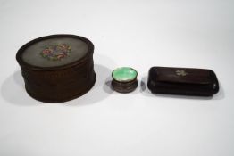An enamel and silver pill box, a round gilt metal box with embroidered lid, 8.