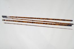 A four piece 'flamed bamboo' early roach pole,