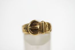 A 9 carat gold buckle ring, finger size M, 5.