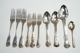 A collection of antique silver flatware,