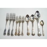 A collection of antique silver flatware,