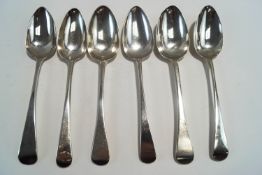 A matched set of six antique silver table spoons, various makers and dates, old English pattern,