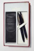 A Sheaffer 'Millennium' fountain pen and ballpoint pen set, the former with 18K 'Feather Touch' nib,