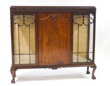 An Edwardian mahogany display cabinet, from Maples Antiques,