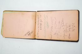 An Autograph book with signatures from predominantly the London 1948 Olympics,