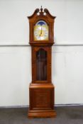 A modern mahogany cased Hermle longcase clock, with three weight chiming movement,