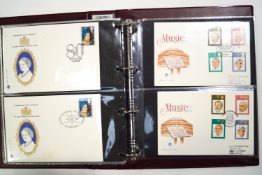 Eight albums containing 560 Stuart First Day Covers,