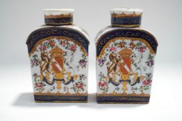 A pair of Samson tea caddies and covers, with armorial decoration of a lion and unicorn,