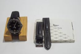A Breitling Navitimer, model E56059L, duo analogue and digital display black dial, titanium case,