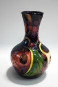 A Moorcroft 'Queens Choice' vase by Emma Bosson, printed and painted marks to base, 19cm high,