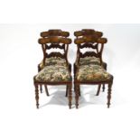 A set of four William IV mahogany dining chairs,