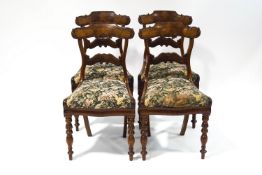 A set of four William IV mahogany dining chairs,
