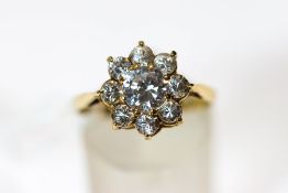 A 9 carat gold cubic zirconia cluster ring, finger size Q1/2, 2.