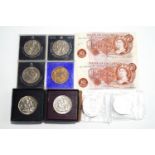 A small collection of coins, including commemorative and 1951 Festival of Britain,