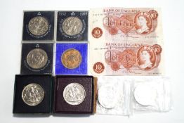 A small collection of coins, including commemorative and 1951 Festival of Britain,