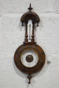 A small German mahogany cased barometer,