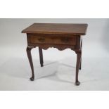 A George III style mahogany side table with one frieze drawer, shaped apron on cabriole legs,