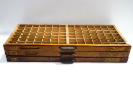 Three old wooden printing type trays,