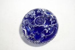 A lampwork paperweight of the lion and unicorn