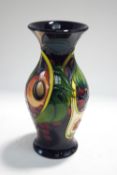 A Moorcroft 'Queens Choice' vase by Emma Bosson, printed and painted marks to base, 19.