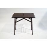 A mahogany coaching table with shaped folding top,