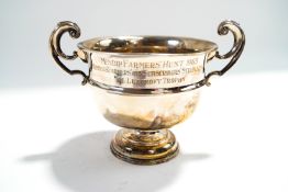 A two handled trophy bowl, Birmingham 1910, inscribed 'Mendip Farmers Hunt-1965', 18 cm across,