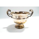 A two handled trophy bowl, Birmingham 1910, inscribed 'Mendip Farmers Hunt-1965', 18 cm across,