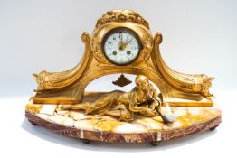 An Art Deco style marble mantel clock with later gilt paint, the painted dial signed H Peschet,