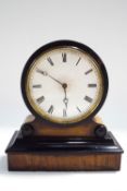 An early 20th century ebonised mantel clock with bob pendulum, 17cm high,