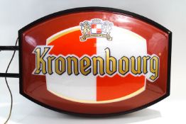An illuminated double sided advertising sign, 61cm high,