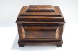 A 19th century walnut work box, the cushion shaped sides and top with parquetry inlay,