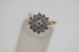 A 9 carat gold Cubic Zirconia cluster ring, finger size K, 2.