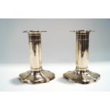 A pair of loaded silver candlesticks, Sheffield 1906, 12.