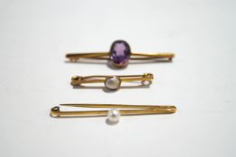 An amethyst bar brooch; with a two other bar brooches; 8.