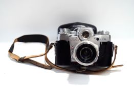 A Zeiss Ikon Contarex 'Bulls' Eye' SLR camera,