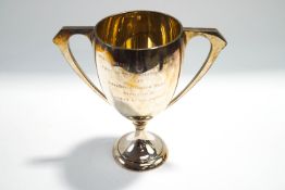 A silver two handled trophy cup, Birmingham 1935,