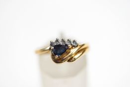 A 9 carat gold sapphire and diamond ring,
