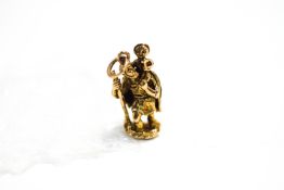 A 9 carat gold St Christopher charm, modelled in the round, 6.