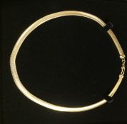 A necklace, of flat snake type links, unmarked, tests as gold, 23 g gross,
