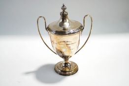 A silver two handled trophy cup and cover, Birmingham 1931,