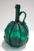 A Continental green glass decanter, possibly Italian,