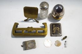 A brass tilt top miniature table,